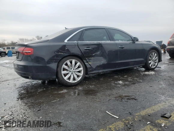 2017 Audi A8 Sport z VIN WAU43AFD2HN003499, wystawiony jako Copart lot #88994855 z przebiegiem 93 734 mil mil oraz Szkoda całkowita • Salvage title. Historia ofert i sprzedaży dostępna na DreamBid. Obrazek 3.