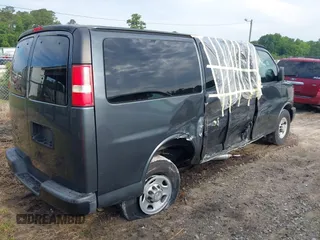 2014 Chevrolet Express Passenger LS with VIN 1GAWGPFG6E1173373, listed as a IAAI auction lot 42275513 with 26,642 mi miles and . Bid and sale history available at DreamBid. Image 4.
