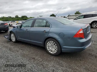 2012 Ford Fusion Hybrid с VIN 3FADP0L32CR184712, выставлен на аукционе Copart как лот 58517555 с пробегом 196 644 миль миль и Списание • Salvage title. История ставок и продаж доступна на DreamBid. Изображение 2.