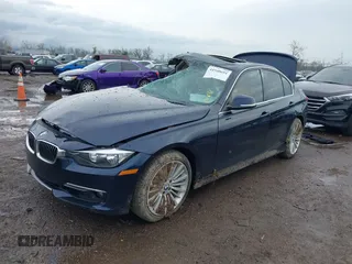 2012 BMW 3 Series 328i with VIN WBA3A5C53CF349506, listed as a IAAI auction lot 41940691 with 79,636 mi miles and . Bid and sale history available at carsss.com. Image 2.