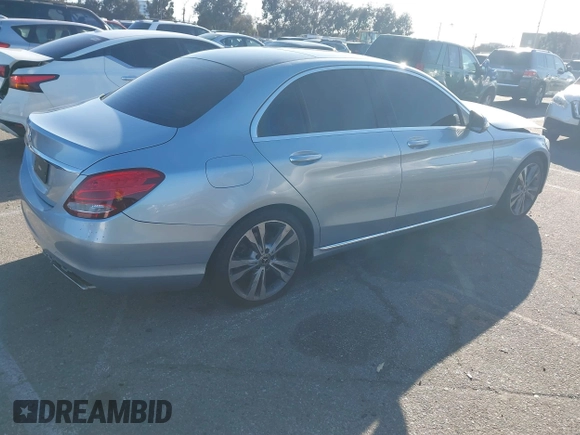 2018 Mercedes-Benz C 300 with VIN 55SWF4JB1JU244077, listed as a IAAI auction lot 41795613 with 90,900 mi miles and . Bid and sale history available at DreamBid. Image 4.