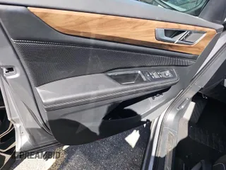 2024 Volkswagen Atlas SE z VIN 1V2HR2CA4RC558128, wystawiony jako IAAI lot #42852874 z przebiegiem 23 623 mil mil oraz . Historia ofert i sprzedaży dostępna na DreamBid. Obrazek 1.