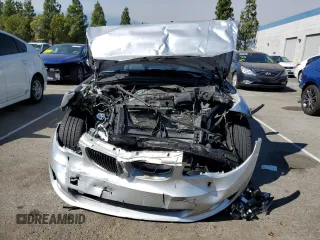 2013 BMW 1 Series 128i z VIN WBAUN1C55DVR01242, wystawiony jako Copart lot #71388854 z przebiegiem 35 350 mil mil oraz Szkoda całkowita • Salvage title. Historia ofert i sprzedaży dostępna na DreamBid. Obrazek 5.