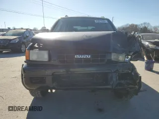 1999 Isuzu Rodeo S with VIN 4S2CK58W2X4336401, listed as a Copart auction lot 83872484 with 191,278 mi miles and Salvage title. Bid and sale history available at DreamBid. Image 5.