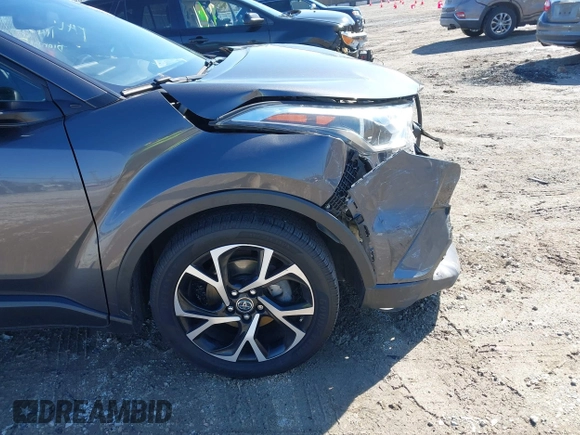2018 Toyota C-HR XLE z VIN NMTKHMBX5JR042941, wystawiony jako IAAI lot #41803153 z przebiegiem 110 220 mil mil oraz . Historia ofert i sprzedaży dostępna na DreamBid. Obrazek 18.