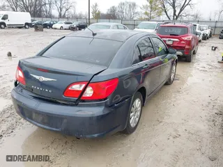2008 Chrysler Sebring LX with VIN 1C3LC46K98N111864, listed as a IAAI auction lot 41470008 with 150,849 mi miles. Bid and sale history available at carsss.com. Image 4.