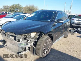 2018 BMW X1 sDrive28i with VIN WBXHU7C30J5L04913, listed as a IAAI auction lot 41755344 with 101,867 mi miles. Bid and sale history available at carsss.com. Image 23.