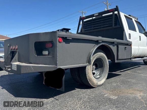 2003 Ford F-350 with VIN 1FDWW37P93EC03534, listed as a Copart auction lot 50217135 with 123,606 mi miles and Clean title. Bid and sale history available at DreamBid. Image 4.