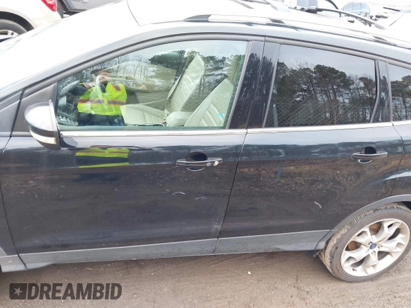 2016 Ford Escape Titanium with VIN 1FMCU9J91GUA59639, listed as a IAAI auction lot 41058369 with 138,046 mi miles. Bid and sale history available at carsss.com. Image 15.