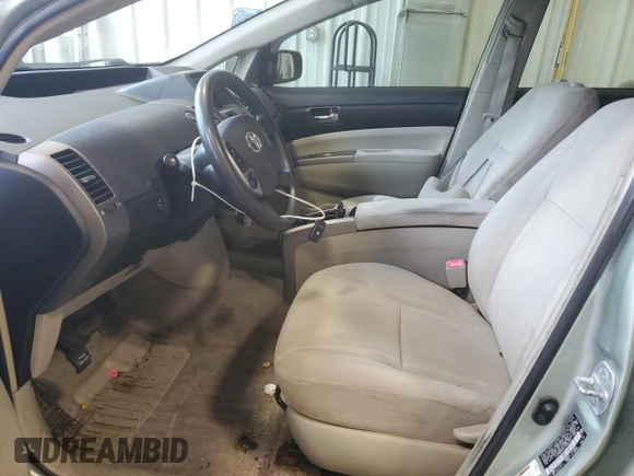 2007 Toyota Prius z VIN JTDKB20U577556730, wystawiony jako Copart lot #61117255 z przebiegiem Nie podano mil oraz Nie do naprawy • Non repairable. Historia ofert i sprzedaży dostępna na DreamBid. Obrazek 7.