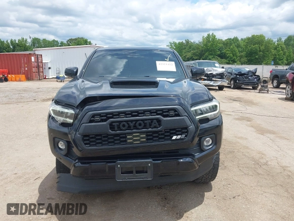 2020 Toyota Tacoma SR5 z VIN 3TMAZ5CN8LM138501, wystawiony jako IAAI lot #42321412 z przebiegiem 81 806 mil mil oraz . Historia ofert i sprzedaży dostępna na DreamBid. Obrazek 12.