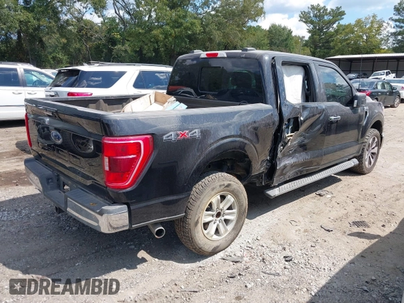 2021 Ford F-150 XL with VIN 1FTFW1E5XMKE21429, listed as a IAAI auction lot 40347406 with 125,000 mi miles. Bid and sale history available at carsss.com. Image 4.