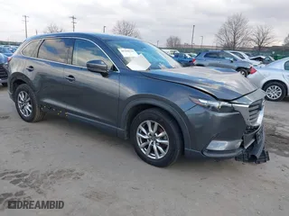2016 Mazda CX-9 Touring with VIN JM3TCBCY2G0119056, listed as a IAAI auction lot 41268136 with 134,667 mi miles. Bid and sale history available at carsss.com. Image 1.