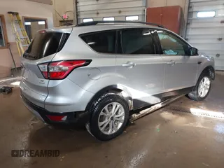 2018 Ford Escape SE with VIN 1FMCU0G94JUB62791, listed as a IAAI auction lot 41410702 with 115,180 mi miles. Bid and sale history available at carsss.com. Image 4.