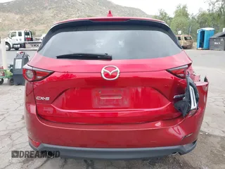 2018 Mazda CX-5 Grand Touring with VIN JM3KFADMXJ0302656, listed as a IAAI auction lot 42099173 with 125,378 mi miles and . Bid and sale history available at DreamBid. Image 16.
