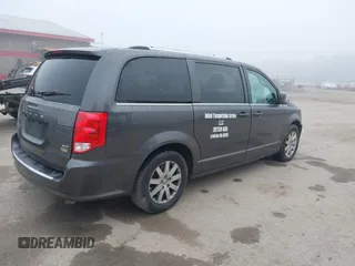 2019 Dodge Grand Caravan SXT with VIN 2C4RDGCGXKR723991, listed as a IAAI auction lot 40670679 with 174,387 mi miles and . Bid and sale history available at DreamBid. Image 4.