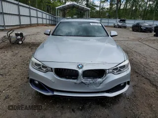 2016 BMW 4 Series 428i xDrive z VIN WBA4C9C52GG136035, wystawiony jako Copart lot #52501455 z przebiegiem 181 086 mil mil oraz Szkoda całkowita • Salvage title. Historia ofert i sprzedaży dostępna na DreamBid. Obrazek 5.