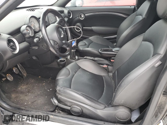 2013 MINI Roadster S z VIN WMWSY3C58DT566208, wystawiony jako Copart lot #41480595 z przebiegiem 119 265 mil mil oraz Szkody całkowita. Historia ofert i sprzedaży dostępna na DreamBid. Obrazek 7.