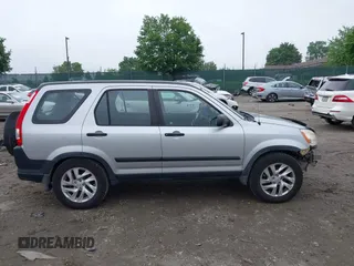 2006 Honda CR-V LX z VIN JHLRD785X6C006967, wystawiony jako IAAI lot #42279490 z przebiegiem 250 750 mil mil oraz . Historia ofert i sprzedaży dostępna na DreamBid. Obrazek 14.