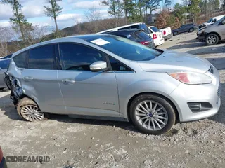 2013 Ford C-Max Hybrid SEL with VIN 1FADP5BU8DL520712, listed as a IAAI auction lot 41158589 with 175,025 mi miles. Bid and sale history available at carsss.com. Image 13.