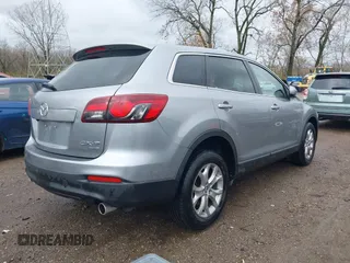 2014 Mazda CX-9 Touring with VIN JM3TB3CA8E0437272, listed as a IAAI auction lot 40833160 with 153,267 mi miles. Bid and sale history available at carsss.com. Image 4.