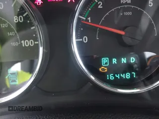 2011 Jeep Wrangler Unlimited Rubicon with VIN 1J4BA6H10BL536027, listed as a IAAI auction lot 42567901 with 164,487 mi miles and . Bid and sale history available at DreamBid. Image 15.