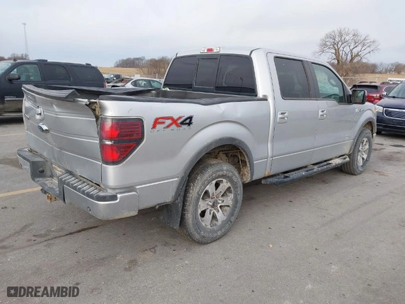 2013 Ford F-150 XL with VIN 1FTFW1ET8DFB81319, listed as a IAAI auction lot 41103635 with 218,615 mi miles. Bid and sale history available at carsss.com. Image 4.