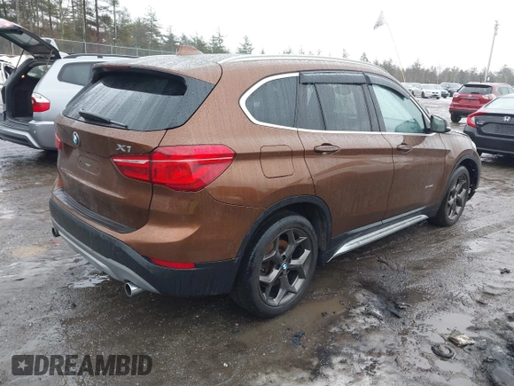 2016 BMW X1 xDrive28i with VIN WBXHT3C31GP881488, listed as a IAAI auction lot 41693116 with 120,922 mi miles. Bid and sale history available at carsss.com. Image 4.