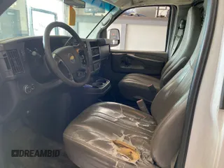 2015 Chevrolet Express Cargo with VIN 1GCWGFCG0F1145334, listed as a IAAI auction lot 42610461 with 143,162 mi miles and . Bid and sale history available at DreamBid. Image 20.