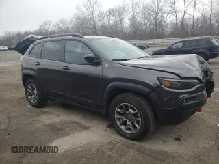 2022 Jeep Cherokee Trailhawk with VIN 1C4PJMBX3ND540147, listed as a Copart auction lot 49957245 with Not Provided miles and Salvage Title. Bid and sale history available at DreamBid. Image 4.