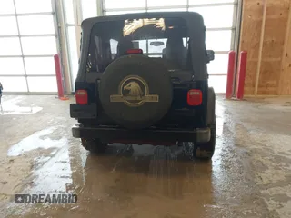 2006 Jeep Wrangler Sport with VIN 1J4FA49S96P733712, listed as a IAAI auction lot 41572913 with 93,511 mi miles. Bid and sale history available at carsss.com. Image 16.