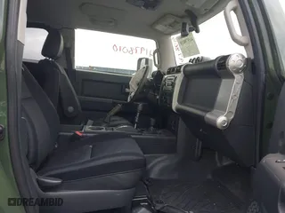 2014 Toyota FJ Cruiser with VIN JTEBU4BF1EK203587, listed as a IAAI auction lot 41978010 with 62,438 mi miles. Bid and sale history available at carsss.com. Image 5.