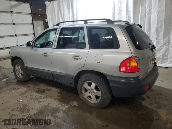 2004 Hyundai Santa Fe GLS with VIN KM8SC73D74U681615, listed as a Copart auction lot 76599554 with 163,530 mi miles and Salvage Title. Bid and sale history available at carsss.com. Image 2.