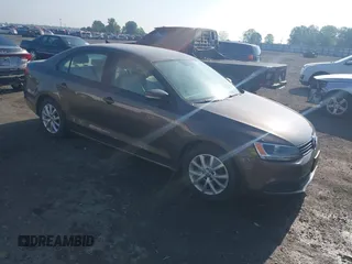 2011 Volkswagen Jetta Sedan SE w/Convenience & Sunroof with VIN 3VWDX7AJXBM329427, listed as a IAAI auction lot 42121116 with 193,490 mi miles. Bid and sale history available at carsss.com. Image 1.