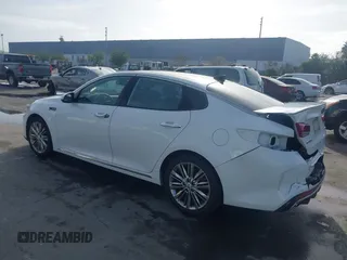 2016 Kia Optima SXL Turbo with VIN 5XXGV4L20GG074869, listed as a IAAI auction lot 41212808 with 82,884 mi miles. Bid and sale history available at carsss.com. Image 3.