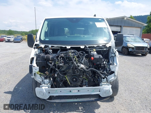 2021 Ford Transit Cargo with VIN 1FTYE1Y82MKA02296, listed as a IAAI auction lot 42377720 with 50,942 mi miles and . Bid and sale history available at DreamBid. Image 12.