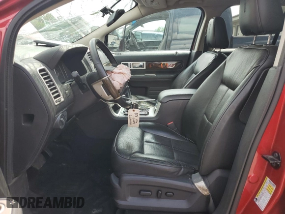 2010 Lincoln MKX z VIN 2LMDJ8JC3ABJ15181, wystawiony jako Copart lot #57303055 z przebiegiem 145 594 mil mil oraz Szkoda całkowita • Salvage title. Historia ofert i sprzedaży dostępna na DreamBid. Obrazek 7.