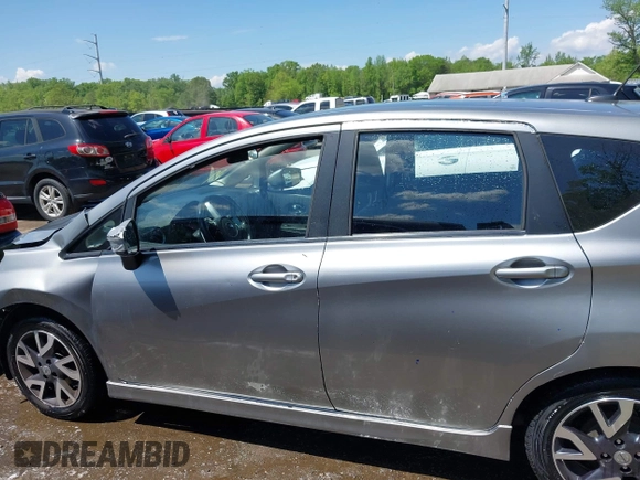 2015 Nissan Note SV with VIN 3N1CE2CP3FL434396, listed as a IAAI auction lot 42159133 with 79,073 mi miles and . Bid and sale history available at DreamBid. Image 14.