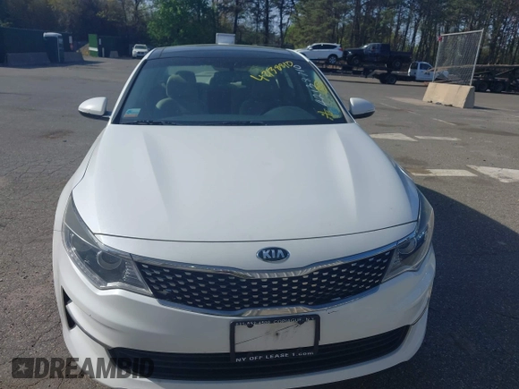 2016 Kia Optima EX with VIN 5XXGU4L32GG070138, listed as a IAAI auction lot 42138810 with 131,040 mi miles. Bid and sale history available at carsss.com. Image 6.