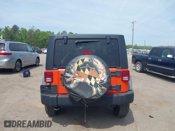 2015 Jeep Wrangler Sport with VIN 1C4AJWAG7FL667462, listed as a IAAI auction lot 42134109 with 85,651 mi miles and . Bid and sale history available at carsss.com. Image 16.