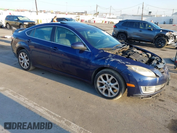 2009 Mazda 6 S Grand Touring with VIN 1YVHP82BX95M21357, listed as a IAAI auction lot 42013043 with 119,701 mi miles and . Bid and sale history available at DreamBid. Image 1.