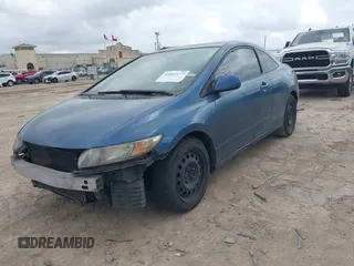 2010 Honda Civic Cpe LX with VIN 2HGFG1B67AH525228, listed as a IAAI auction lot 42047577 with 280,535 mi miles. Bid and sale history available at carsss.com. Image 2.