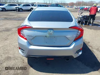 2017 Honda Civic LX z VIN 2HGFC2F53HH513655, wystawiony jako IAAI lot #41968212 z przebiegiem 112 672 mil mil oraz . Historia ofert i sprzedaży dostępna na DreamBid. Obrazek 16.