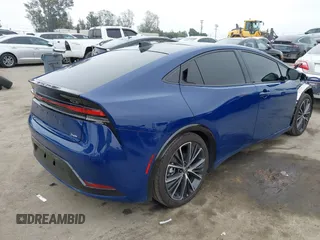 2023 Toyota Prius LE z VIN JTDACAAU8P3002445, wystawiony jako IAAI lot #42159749 z przebiegiem 18 510 mil mil oraz . Historia ofert i sprzedaży dostępna na DreamBid. Obrazek 4.