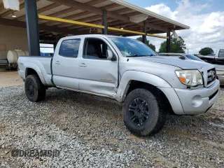 2010 Toyota Tacoma with VIN 3TMMU4FN8AM023377, listed as a Copart auction lot 58592735 with 245,178 mi miles and Salvage title. Bid and sale history available at DreamBid. Image 4.