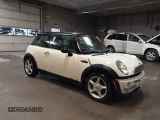 2004 MINI Hardtop with VIN WMWRC33404TC48963, listed as a IAAI auction lot 41661909 with 182,532 mi miles and . Bid and sale history available at DreamBid. Image 1.