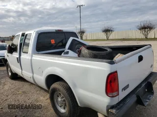 2003 Ford F-250 XL with VIN 3FTNX20LX3MB38136, listed as a Copart auction lot 82703304 with Not provided miles and Salvage title. Bid and sale history available at DreamBid. Image 2.