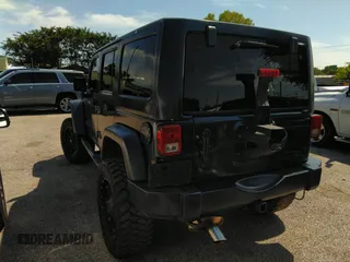 2013 Jeep Wrangler Unlimited Sport z VIN 1C4BJWDG1DL660844, wystawiony jako IAAI lot #42347284 z przebiegiem 168 709 mil mil oraz . Historia ofert i sprzedaży dostępna na DreamBid. Obrazek 3.