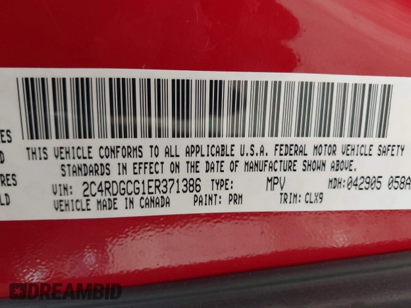 2014 Dodge Grand Caravan SXT with VIN 2C4RDGCG1ER371386, listed as a IAAI auction lot 41822952 with 228,052 mi miles and . Bid and sale history available at DreamBid. Image 9.