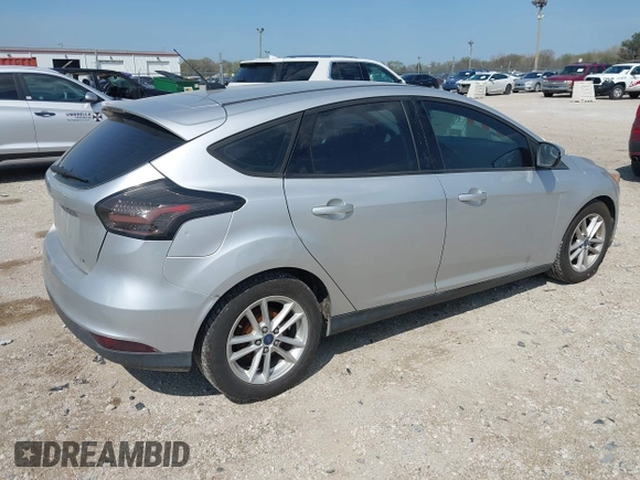 2015 Ford Focus SE with VIN 1FADP3K20FL288791, listed as a IAAI auction lot 42118958 with 164,248 mi miles. Bid and sale history available at carsss.com. Image 4.